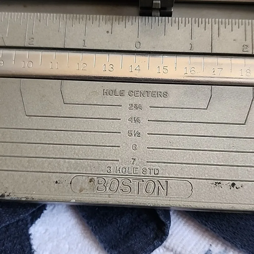 Antique hole punch.       Made in the USA